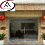 ĐÁ ỐP MẶT TIỀN GRANITE VÀNG HOÀNG GIA